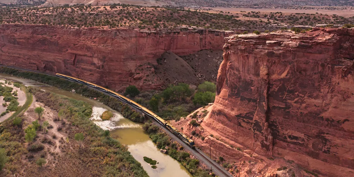 Train in red, rocky landscape