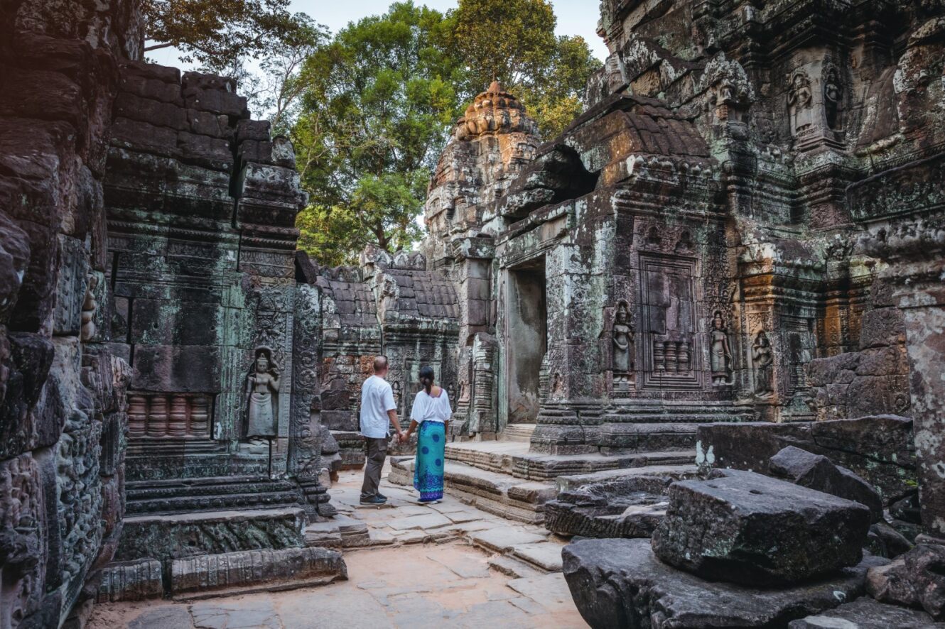 Two people exploring Temple ruins