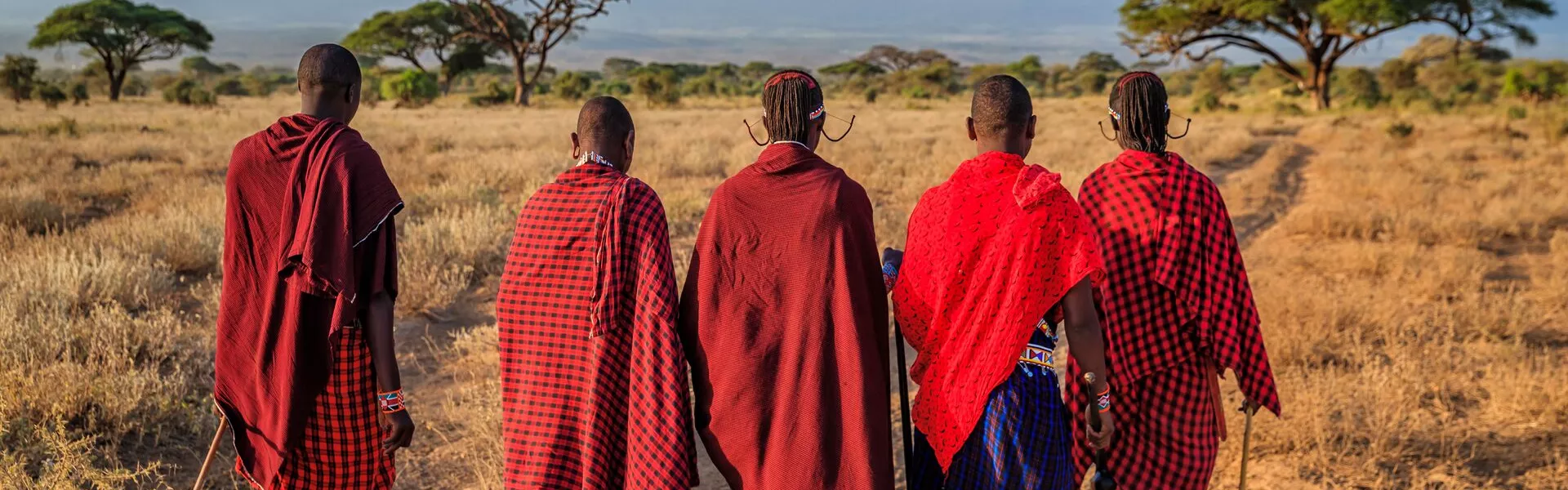 Group Of Maasai Warriors Going Back To Village