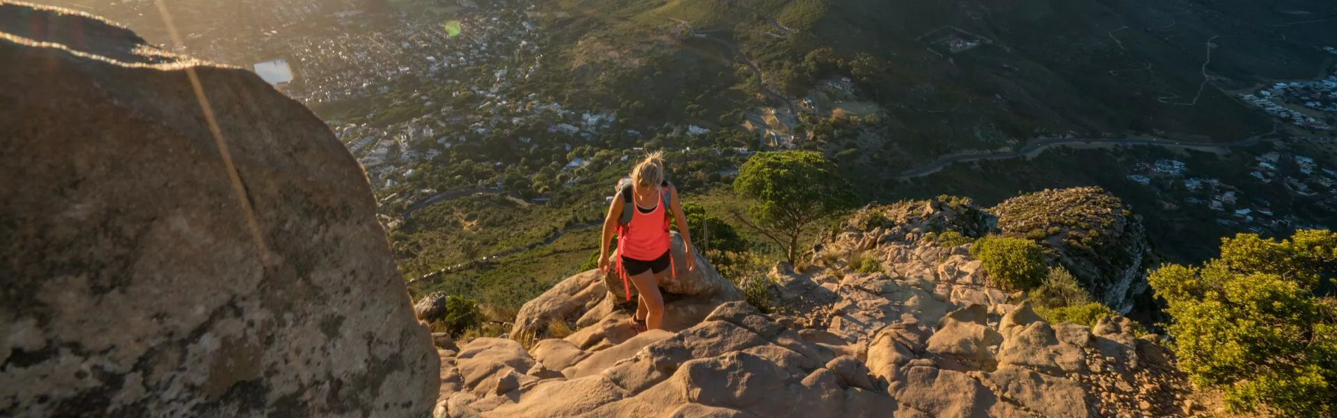 Young Woman Hiking In Cape Town At Sunrise