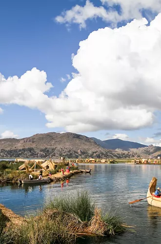 People Living On The Floating Islands Of The Lake Titicaca