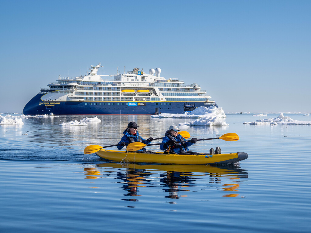Guests From The National Geographic Endurance Kayaking In Ice Off The Island Of Edge Island, Svalbard