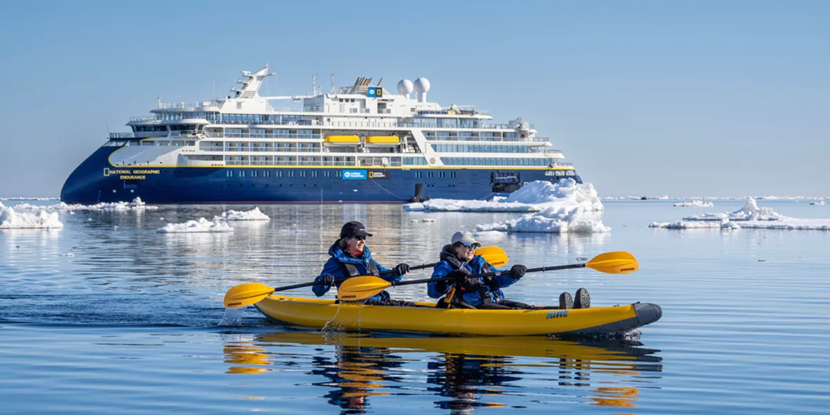 Guests From The National Geographic Endurance Kayaking In Ice Off The Island Of Edge Island, Svalbard