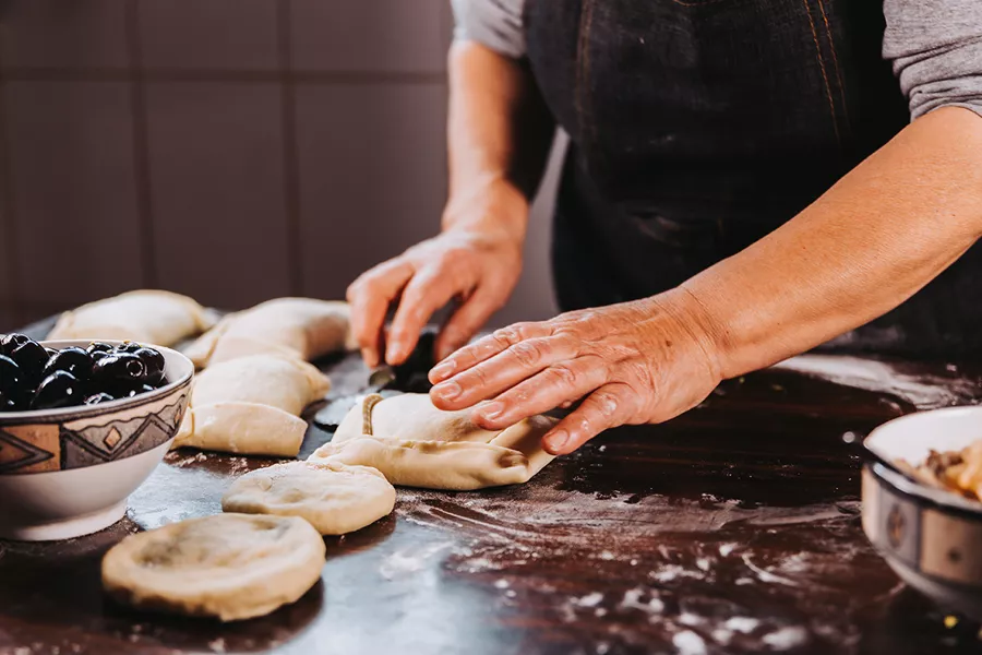 Chile Person Making Empanadas By Hand