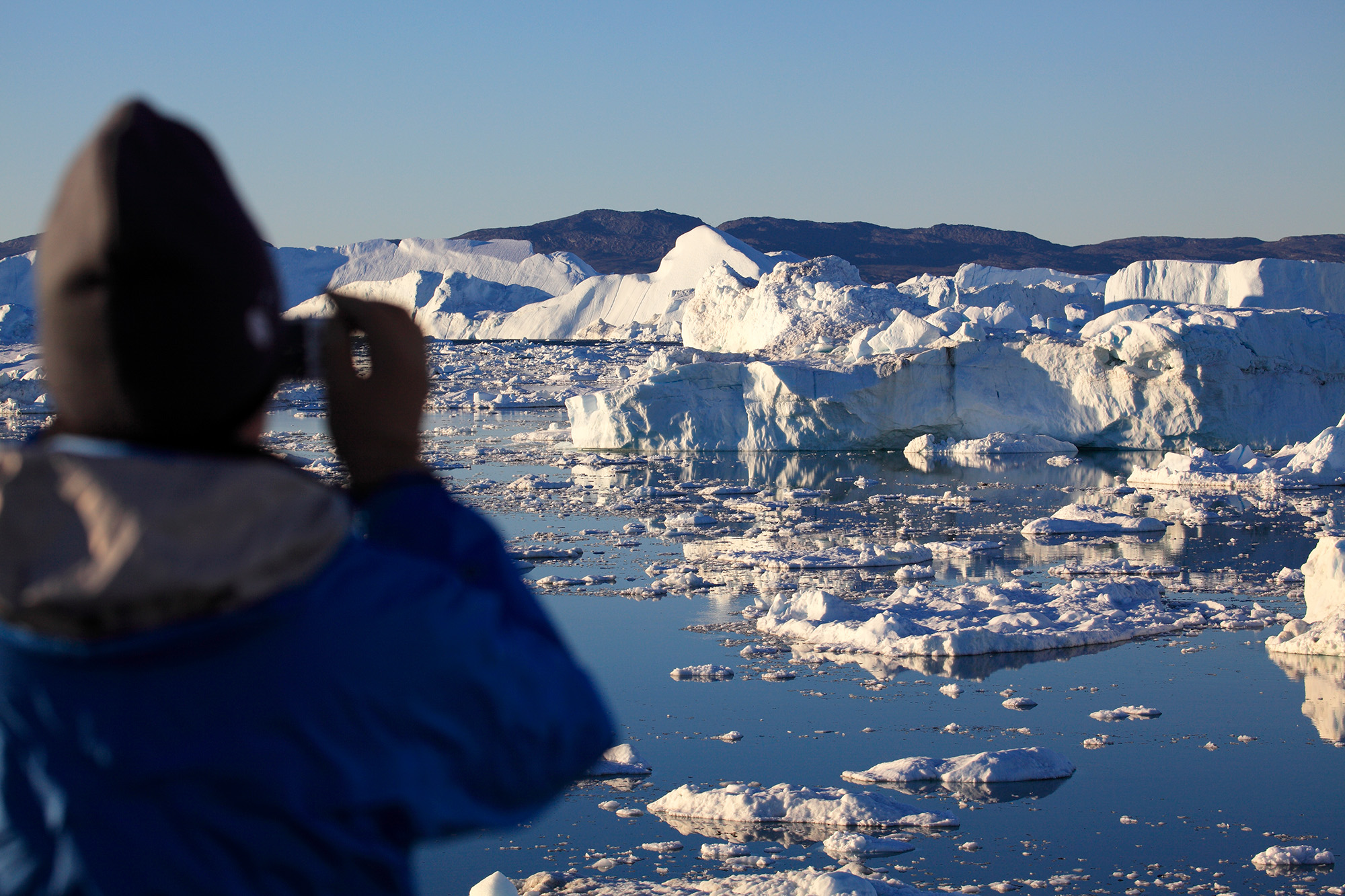  Looking Out From The Coast Of Ilulissat at icebergs