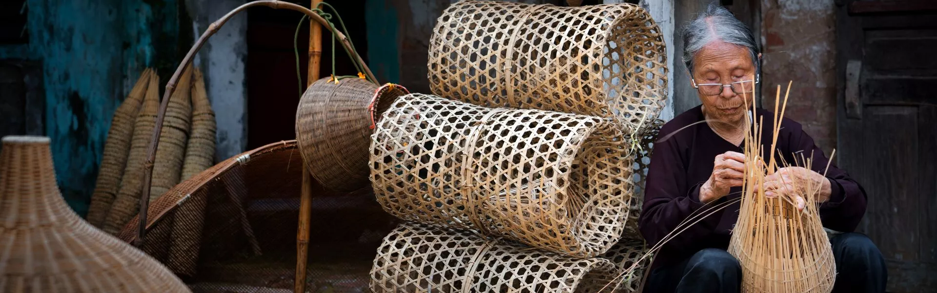 Old Vietnamese Women Doing Basketry For Fishing Equipment